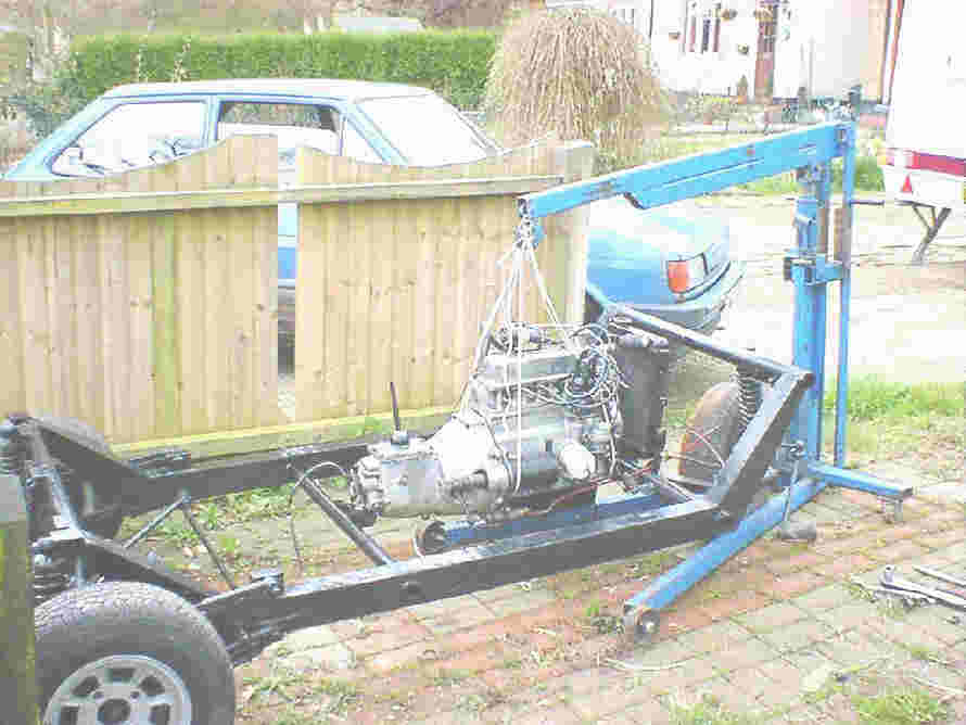 engine being placed into latest restoration project