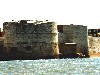 Larger photo of Round Tower from the sea