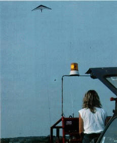 Rona winching a pilot into the air