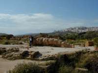 The fallen Telamon, with modern Agrigento in the background