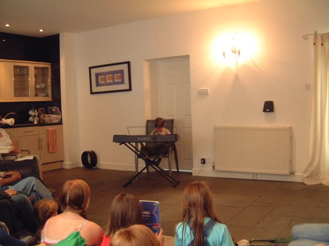 ashleyplayingpiano.jpg
