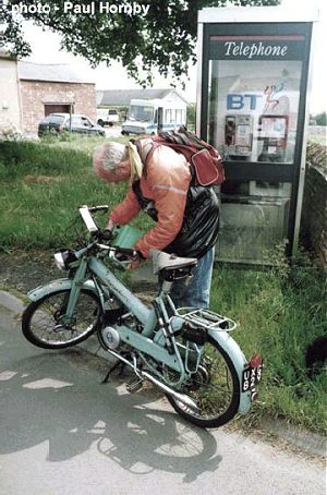 C Selvey refuels his 1952 Follis