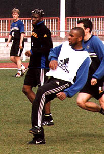 Louis Saha with his new hairdo along with his French buddy Diddier Domi.