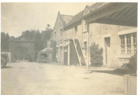 The stable yard. These buildings still there today.  The steps lead to carpenters workshop, and were made out of wood found on beach