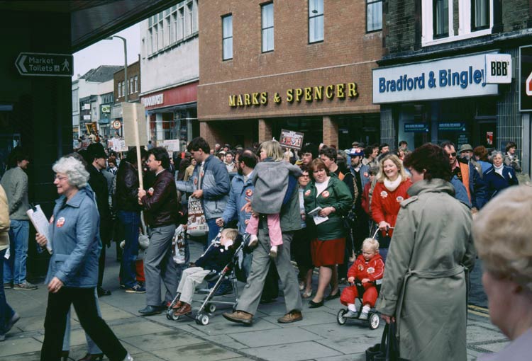 The protestors arrive at the end of John Street, following a march down Pow Street.