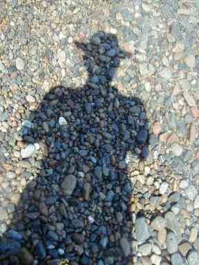 a portrait of Loxias on the beach at Cefalu