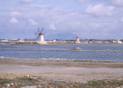 Salt pans and windmills south of Trapani - Erice in the distance