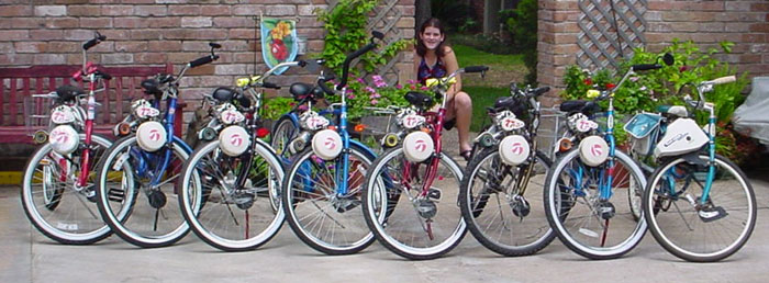 Lauire and eight bikes