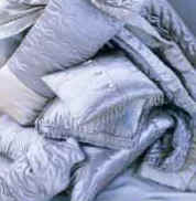 Marylyn Larkin quilted satin collection in oyster, retain details and click here to order