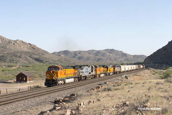 BNSF #5266 + CSX #7588 + BNSF #4925 + NREX #5086 + CN #2400 approaching Crozier Canyon (near Kingman) - May 2004