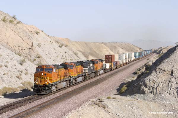 BNSF #4126 + #4992 + NS #9344 + BNSF #5284 at Park Moabi, Needles - May 2004