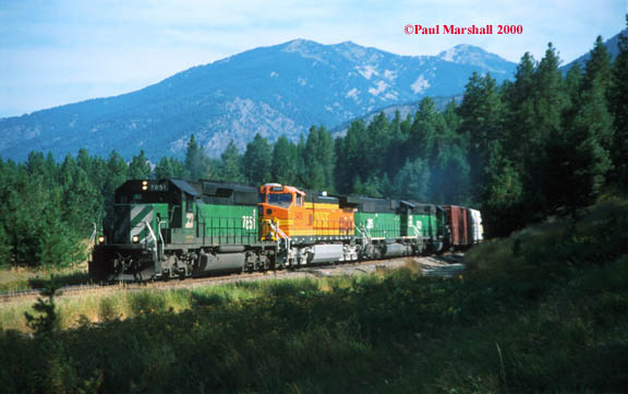 BN SD40-2 #7851 leads an eastbound through Thompson Falls - August 2000