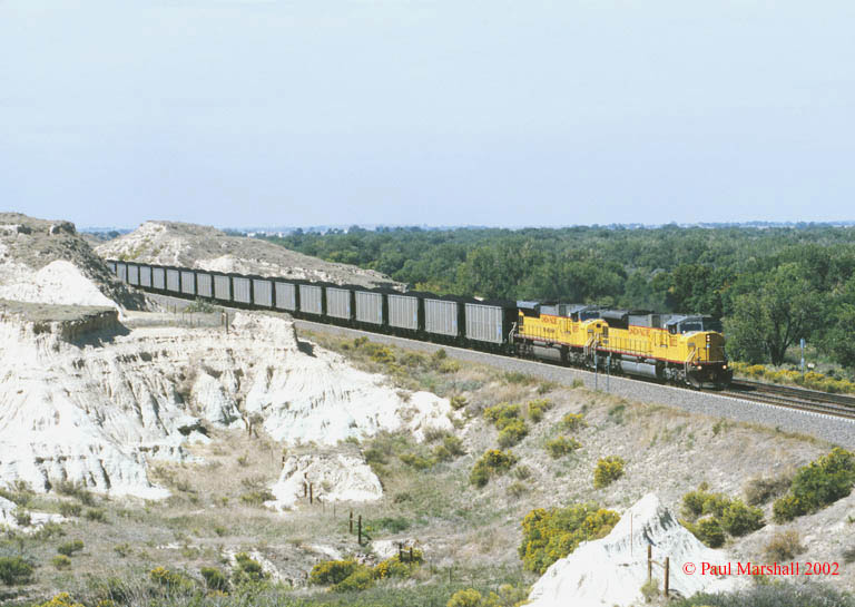 UP SD90MAC's #8053 + #8057 at Terrytown with an E/B coal train - Sept 2002