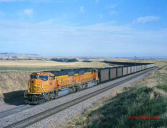 BNSF SD70MAC's #9852 + #8843 is approaching the Lower Horseshoe near Crawford - Sept 2002