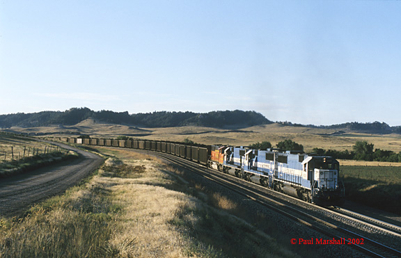 EMD SD60's #9026 + #9055 + #9016 pushing a loaded coal train into the Lower Horseshoe curve near Crawford - Sept 2002
