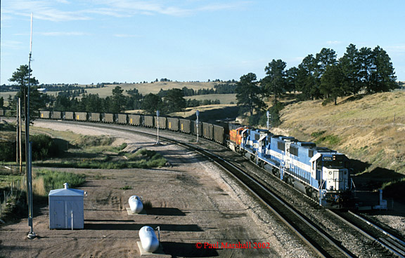 EMD SD60's #9026 + #9055 + #9016 at Belmont, about to cut off after assisting an E/B coal train up Crawford Hill - Sept 2002