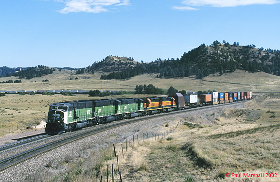Crawford Hill helpers SD60M's #9273 + #9241 + #9270 on the head end of an E/B intermodal. Train engines were SD40-2's #7159 + #7330. Lower Horseshoe, Crawford - Sept 2002