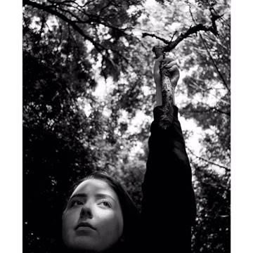 A picture containing tree, outdoor, standing, posing

Description automatically generated