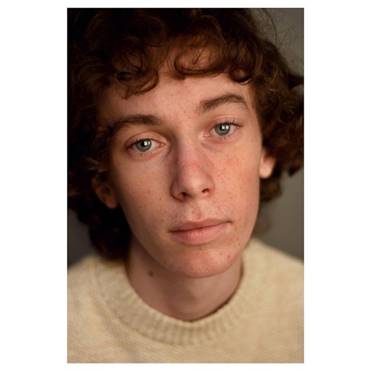 A picture containing text, person, indoor

Description automatically generated
