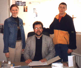 Father Jim with Catherine and Steve