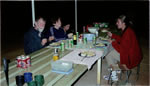 Food and beer in the shadow of Uluru. At night. 20 miles away.