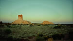 Navigationally significant red rocks at sunset