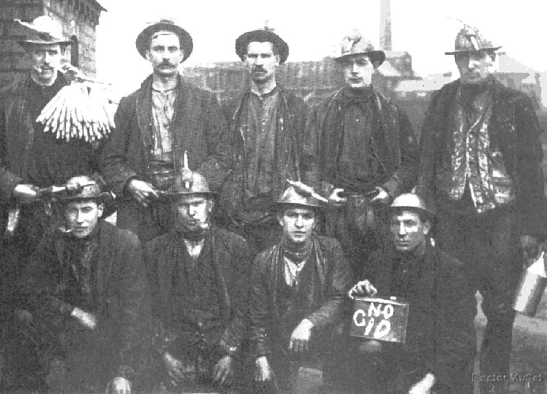 Millom haematite miners (pre 1920) showing their felt hats and tallow candles