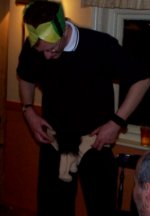 Gids tries  on his convicts attire