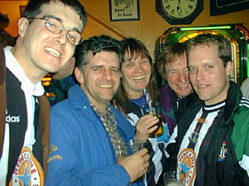 Left to right, Gibbo, Maric, Steph, Jonno and Softie sign autographs for their fans.