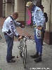 Magnus Backstedt and mechanic check his bike over.