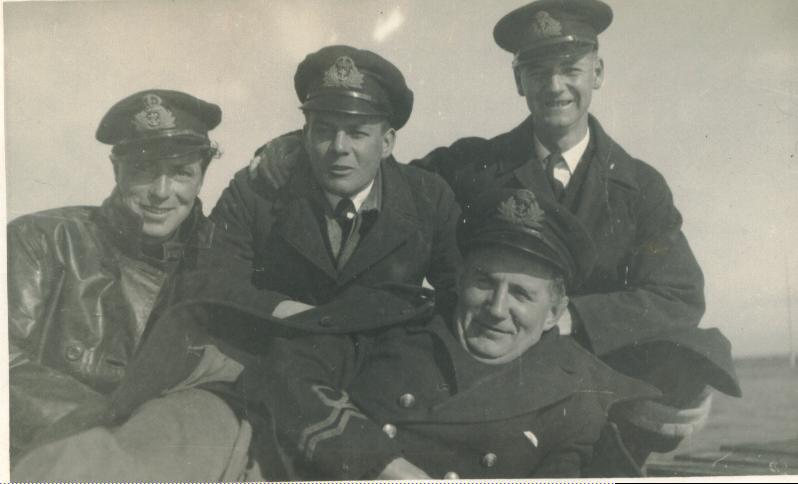 Group taken at Ravenglass: Lt Westnell, Pavey, Self and Young but not sure yet what order they are in...