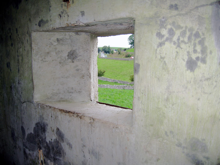 Inside, gunner's-eye view of the A685 road leading up to the Midland railway bridge.