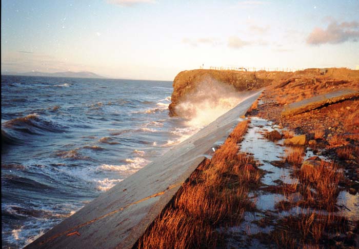 Along the sea-wall showing the remains of the ZAA Magazine (probably the roof or base).