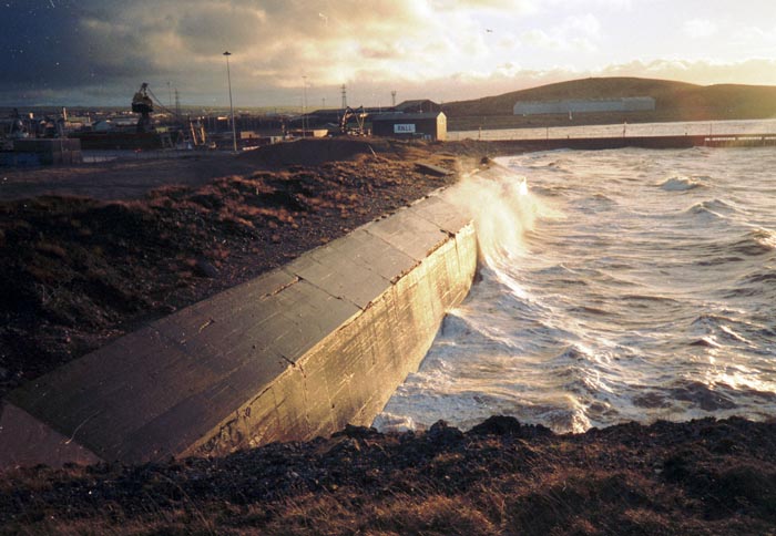 Along the sea-wall showing the remains of the ZAA Magazine (probably the roof).