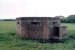 Type F/W 22 pill-box near a guard-house and the Wedholme Flow, showing the entrance.