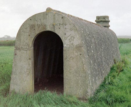 Entrance to prefabricated air-raid shelter at Kirkbride aerodrome, Cumbria.