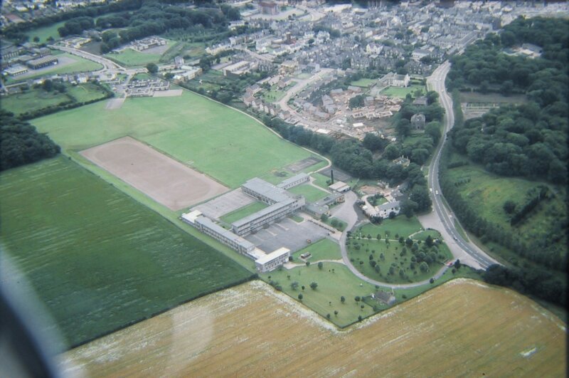 Please be patient - this image is 90kb!  The Grammar School from the air in summer 1985.