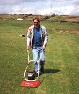 Steve  ''Taxying'  with a lawnmower